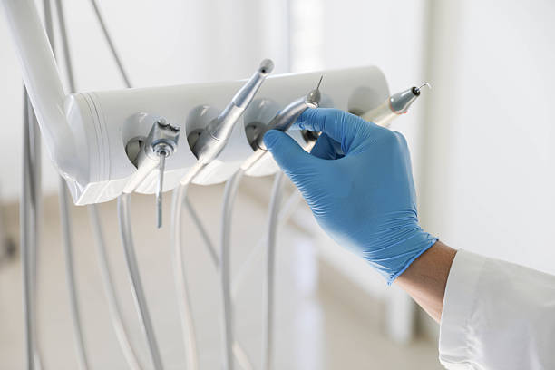 Professional Tooth Extraction technician working in Yadkin County County, NC